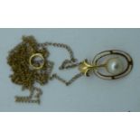 A 9CT GOLD AND PEARL NECKLACE. 1.6 grams. Chain 47 cm long, pendant 1.75 cm x 1 cm.