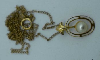 A 9CT GOLD AND PEARL NECKLACE. 1.6 grams. Chain 47 cm long, pendant 1.75 cm x 1 cm.