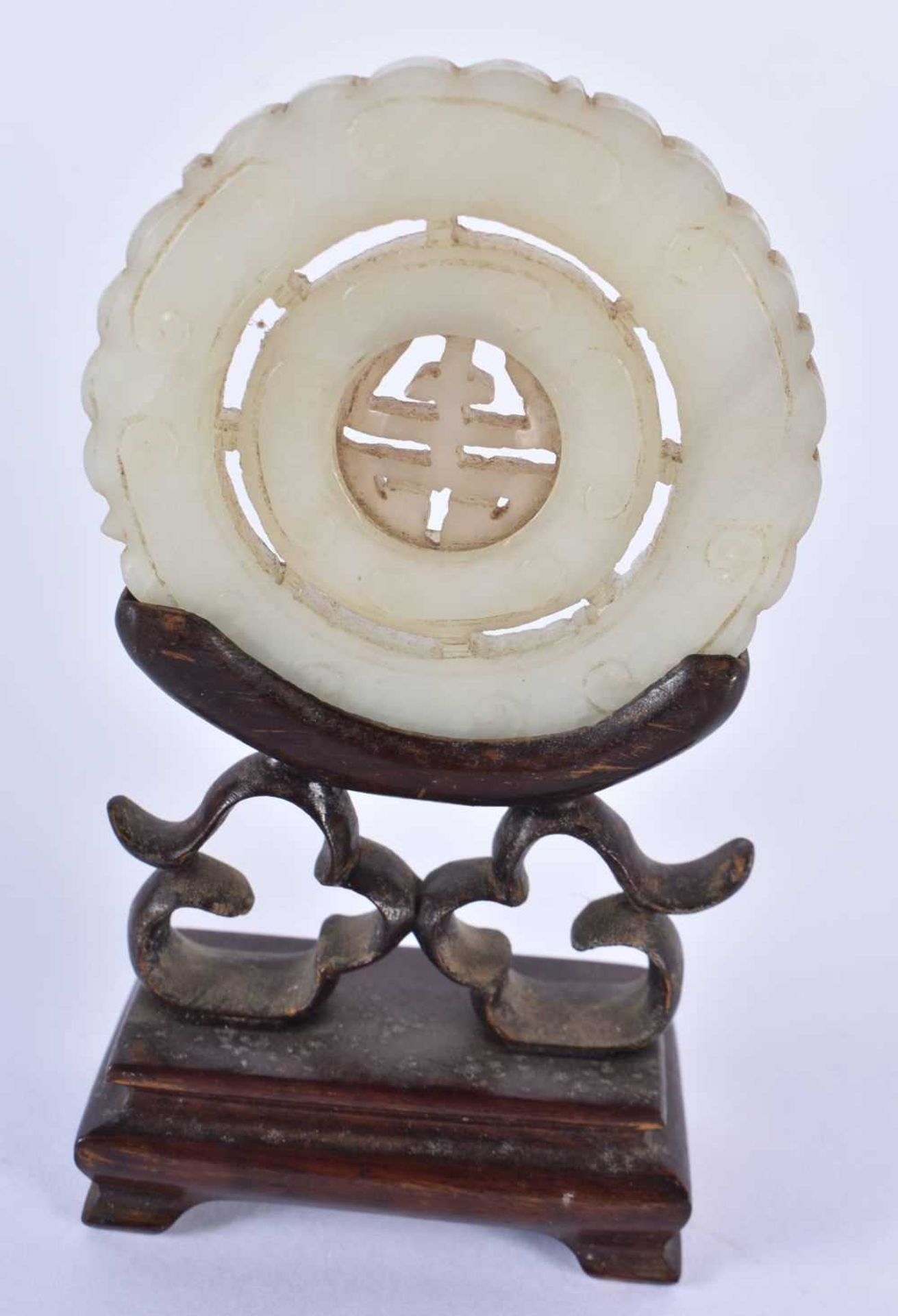 THREE 19TH CENTURY CHINESE GREEN JADE ROUNDELS Qing, in various forms. Jade 5 cm wide. (3) - Image 8 of 14
