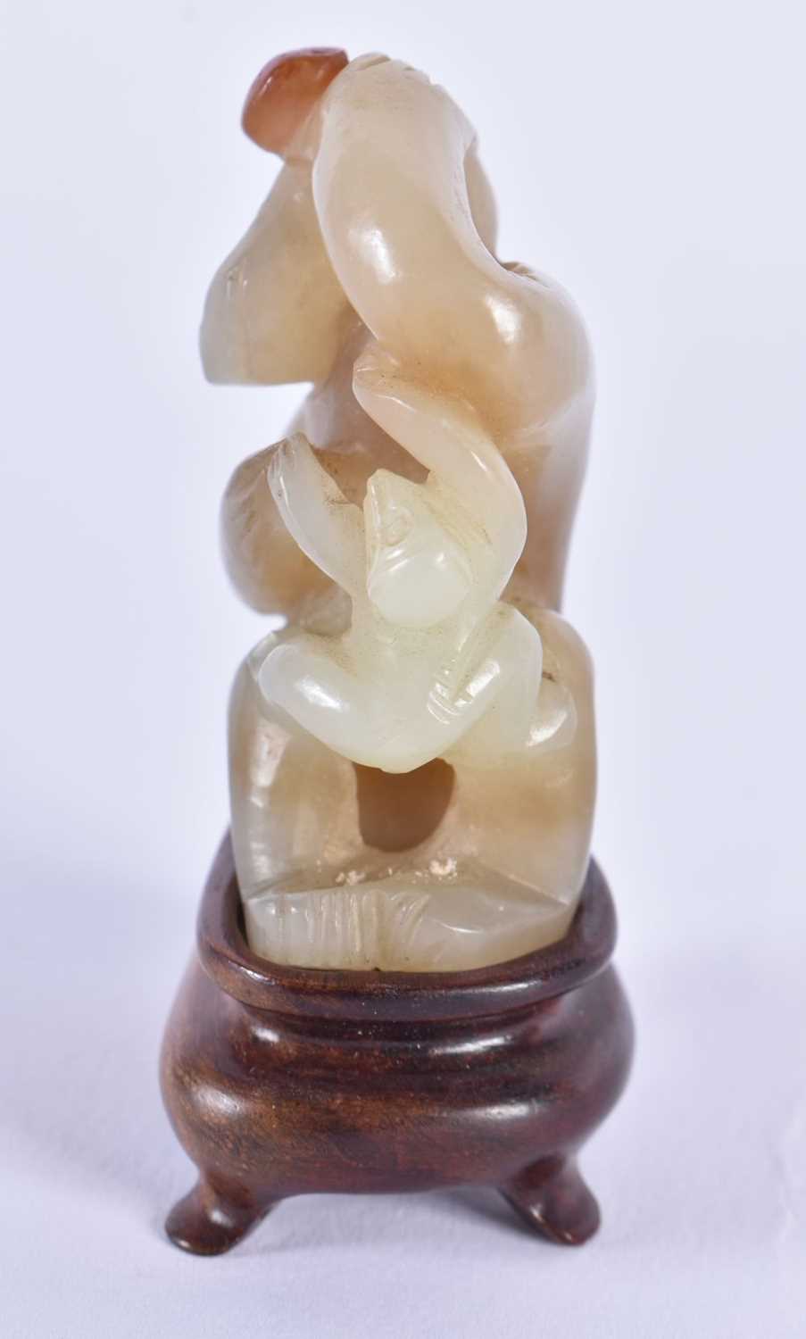 A LOVELY 19TH CENTURY CHINESE CARVED JADE FIGURE OF A MONKEY Qing, modelled with a smaller monkey. 7 - Image 3 of 6