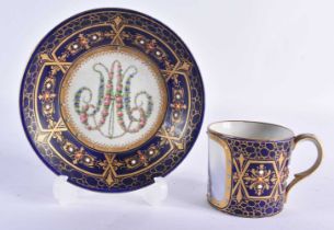 AN EARLY 19TH CENTURY FRENCH SEVRES JEWELLED PORCELAIN CABINET CUP AND SAUCER painted with a