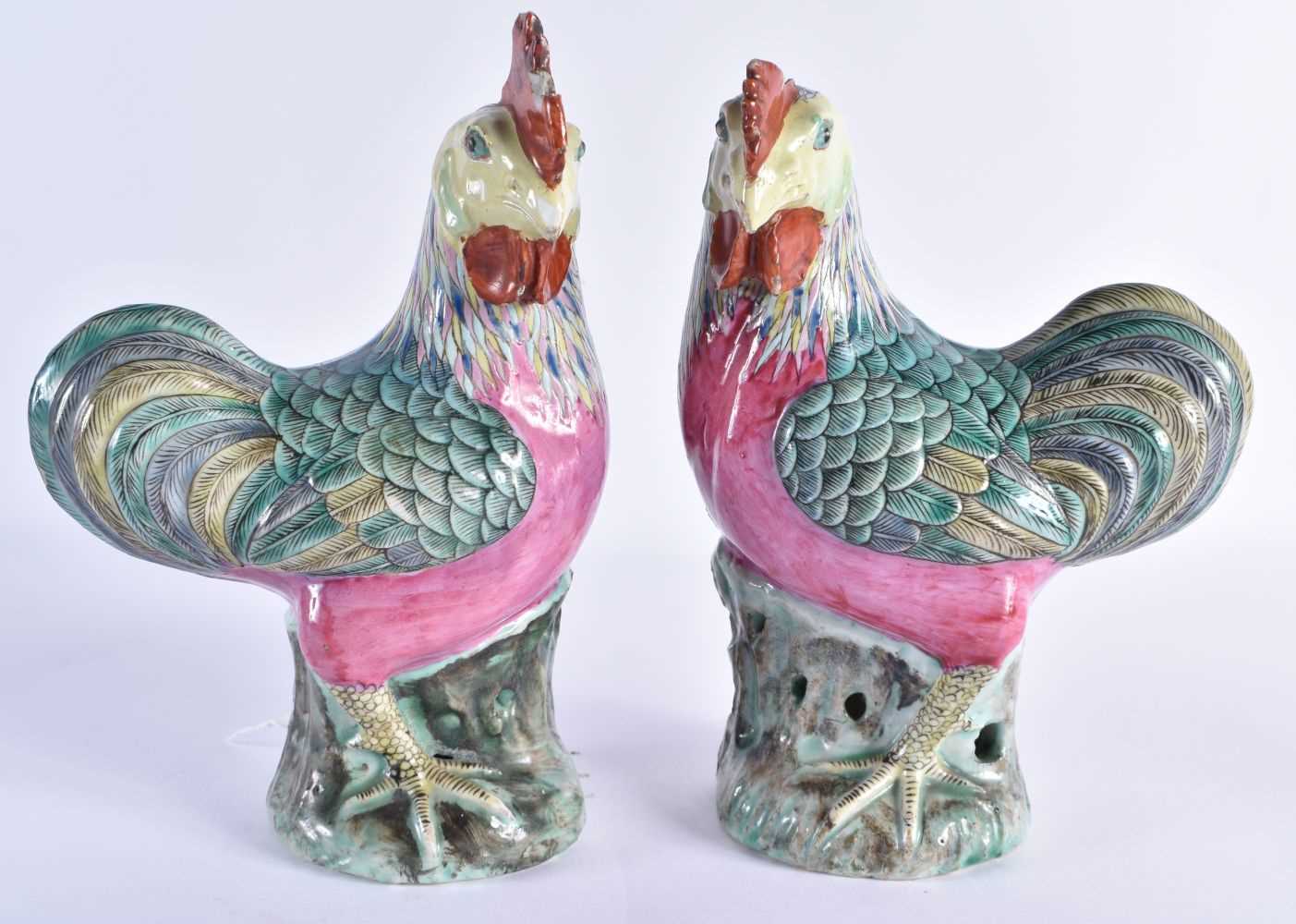 A PAIR OF EARLY 19TH CENTURY CHINESE CANTON FAMILLE ROSE FIGURES OF FOWL Qing, modelled as hens with