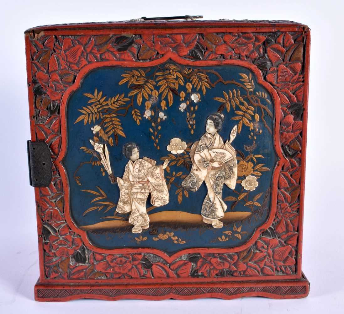 A 19TH CENTURY JAPANESE MEIJI PERIOD CINNABAR LACQUER KODANSU CABINET decorated with figures in - Image 3 of 6
