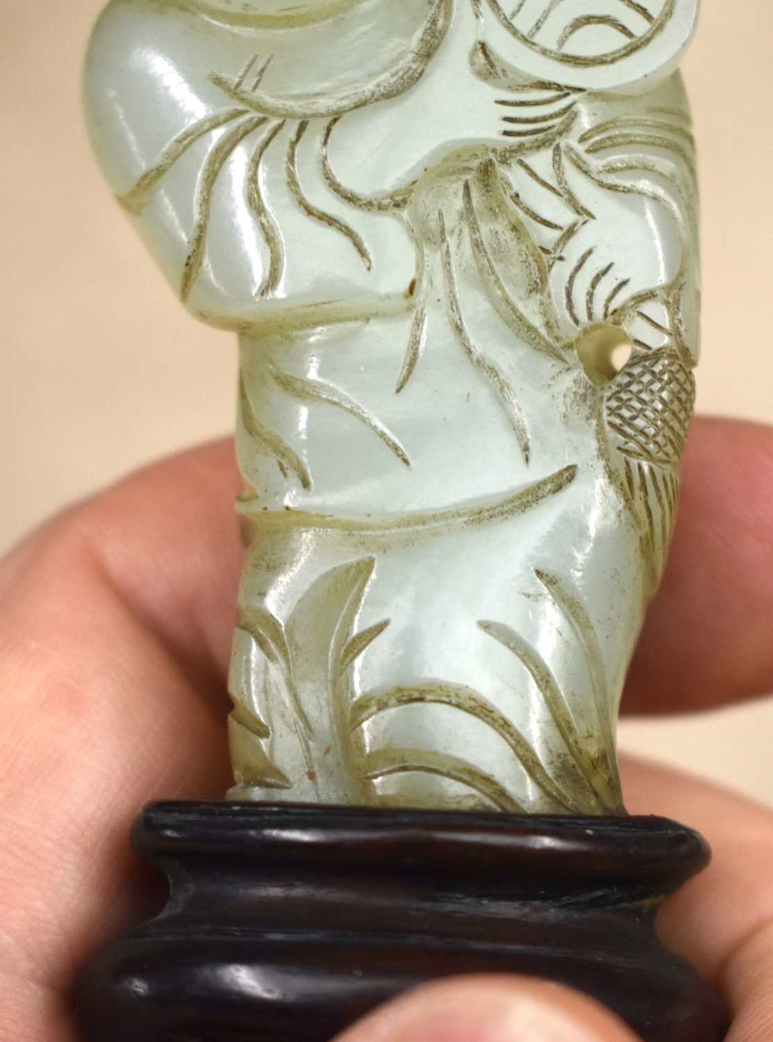 A LOVELY 19TH CENTURY CHINESE CARVED GREEN JADE FIGURE OF A STANDING MALE Qing, modelled holding a - Image 7 of 12