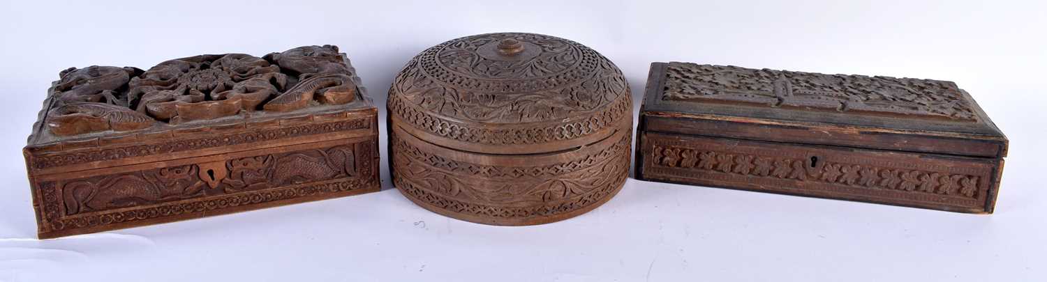 A 19TH CENTURY BURMESE CARVED WOOD DRAGON BOX AND COVER together with two Anglo Indian boxes.