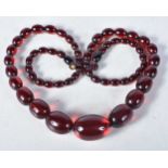 Cherry Bakelite graduated necklace with screw clasp. 72cm long, weight 51g, largest bead 20mm