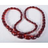 Cherry Bakelite graduated necklace. 88cm long, Largest Bead 22mm, weight 93g