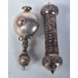 A Continental Silver Miniature Scroll Holder together with a Silver Scent Bottle both with Middle