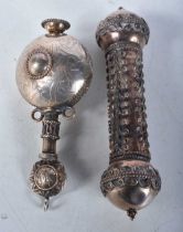 A Continental Silver Miniature Scroll Holder together with a Silver Scent Bottle both with Middle