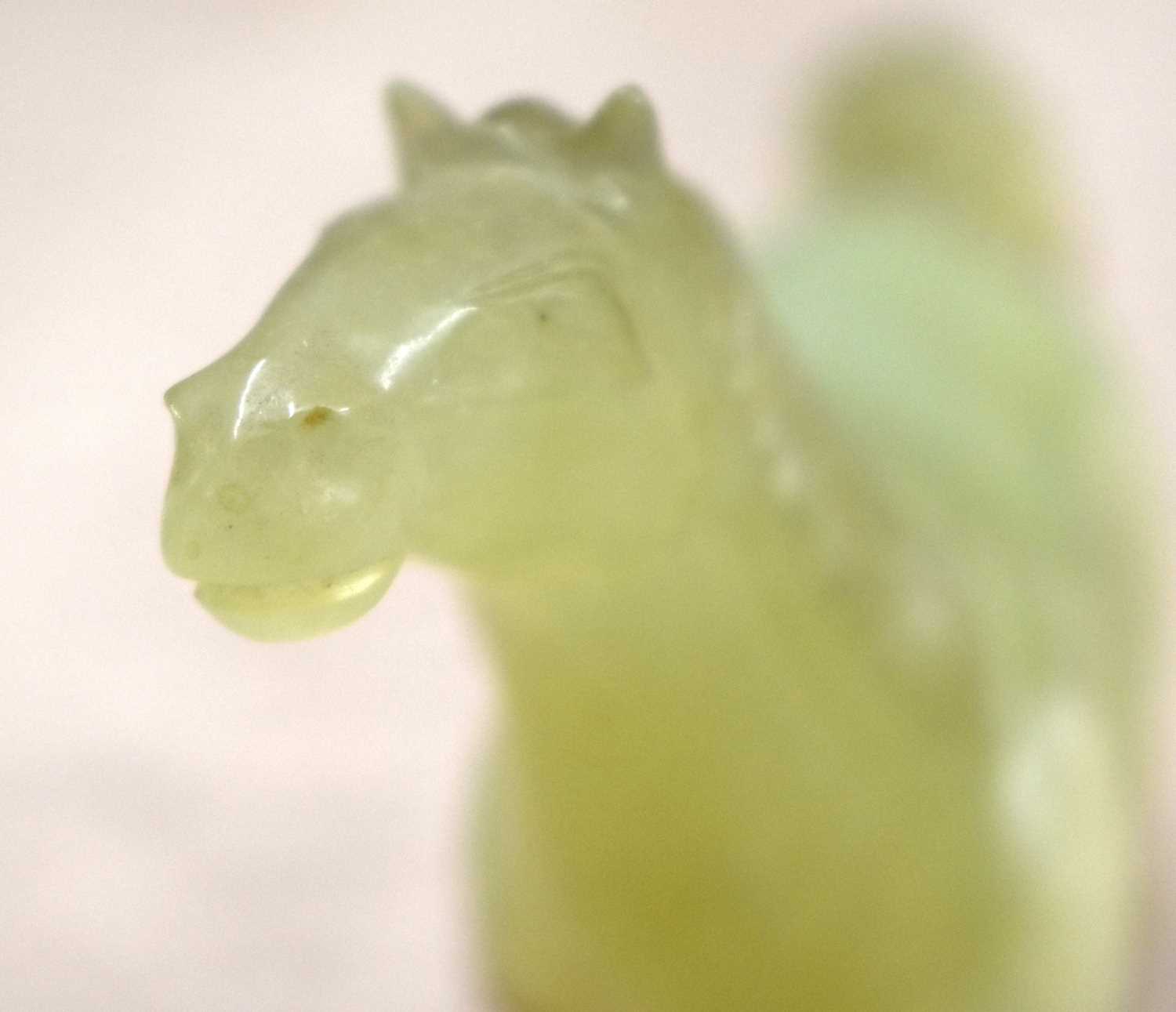 A SET OF SIX LATE 19TH CENTURY CHINESE CARVED JADE HORSES Late Qing, modelled in various forms and - Image 33 of 46