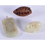 TWO CHINESE QING DYNASTY JADE CARVINGS together with a nut. Largest 5 cm x 3 cm. (3)