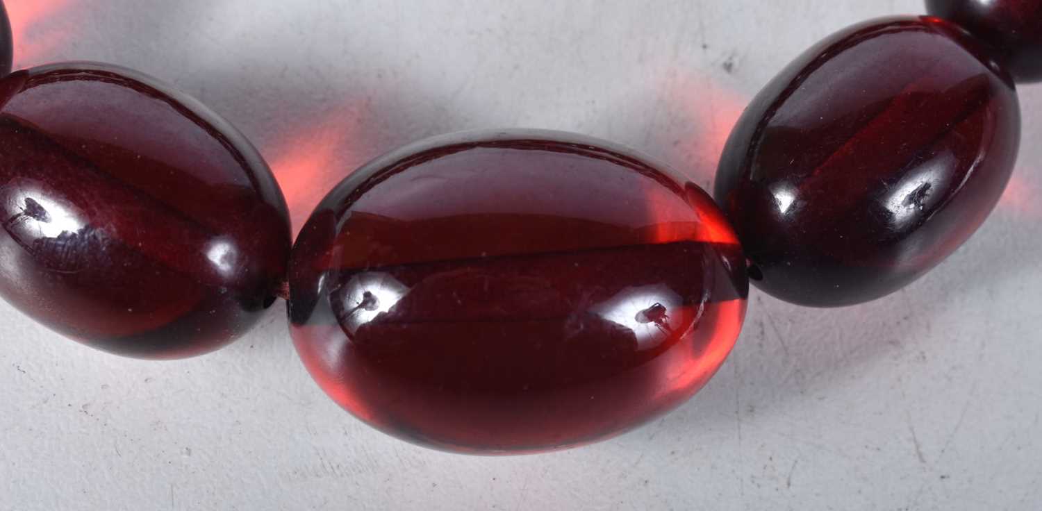 Cherry Bakelite graduated necklace with screw clasp. 72cm long, weight 51g, largest bead 20mm - Image 3 of 3