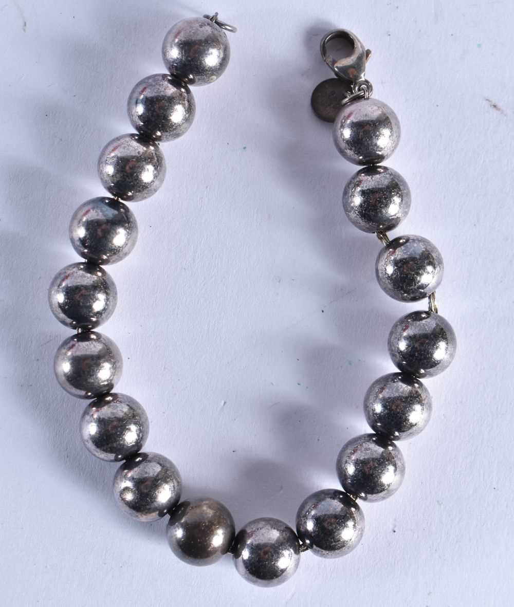Silver beaded bracelet by designer Tiffany & Co. 17 grams. 19 cm long.