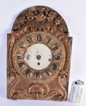 A LARGE 18TH CENTURY CONTINENTAL CARVED GILTWOOD ACANTHUS AND SHELL CAPPED CLOCK FACE formed with