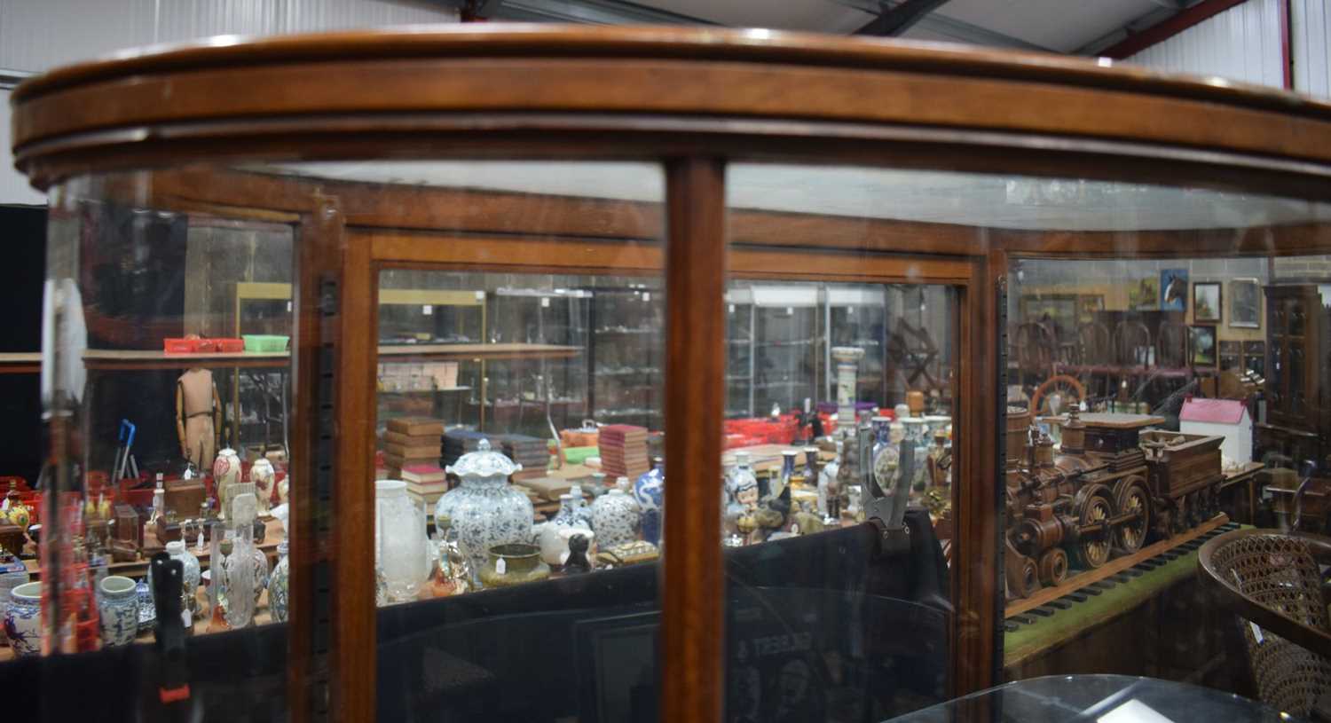 A large mahogany Edwardian bow fronted glass display cabinet with glass shelves and a wooden - Image 6 of 9