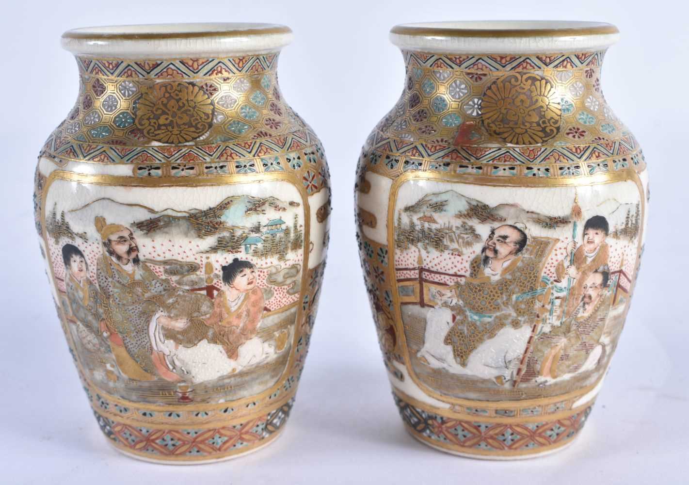 A SMALL PAIR OF 19TH CENTURY JAPANESE MEIJI PERIOD SATSUMA VASES painted with figures and