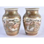 A SMALL PAIR OF 19TH CENTURY JAPANESE MEIJI PERIOD SATSUMA VASES painted with figures and