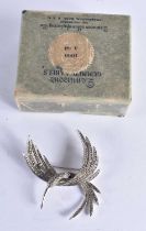 A Marcasite Brooch in the form of a Stylised Humming Bird. 6.4cm x 5.6cm, weight 19.9g.