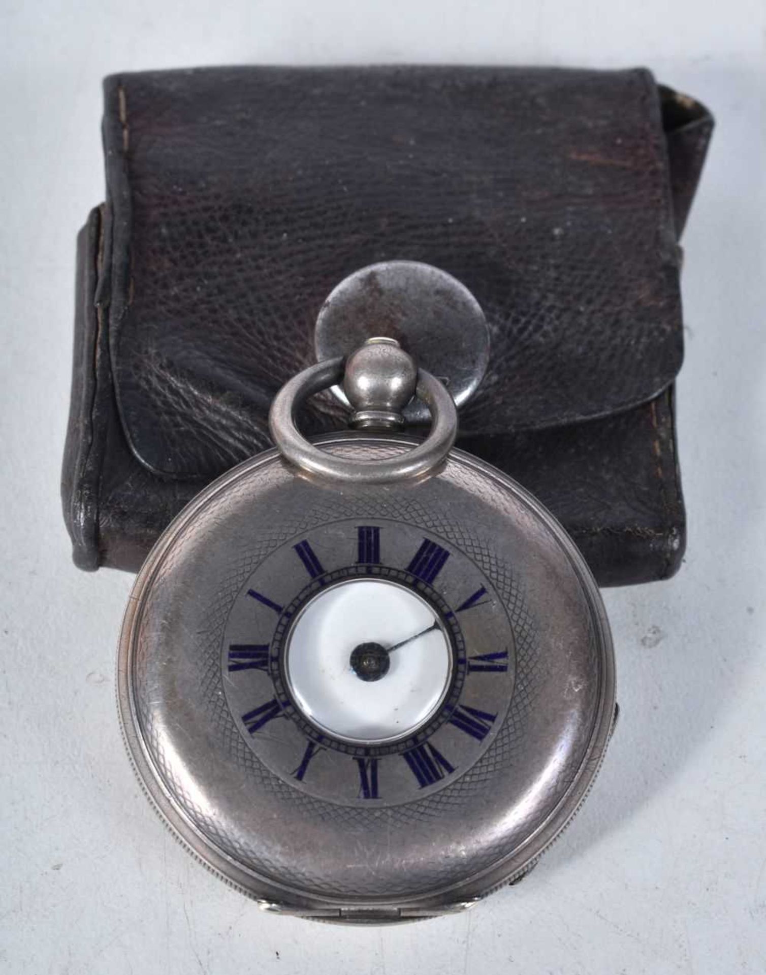 A Miniature Silver Half Hunter Pocket Watch with Black Enamel Numerals on Case in a Leather Pouch.