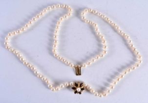 AN EDWARDIAN 9CT GOLD PEARL AND GARNET NECKLACE. 59.1 grams. 42 cm long.