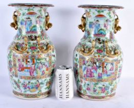 A LARGE PAIR OF 19TH CENTURY CHINESE CANTON FAMILLE ROSE VASES Qing. 34 cm x 15 cm.