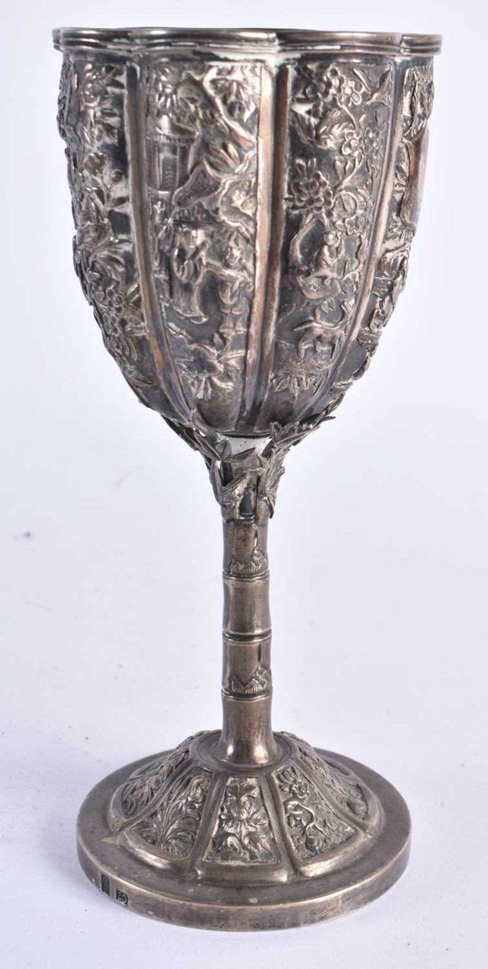 AN ANTIQUE CHINESE EXPORT SILVER REPOUSSE CUP. 202 grams. 17 cm high.