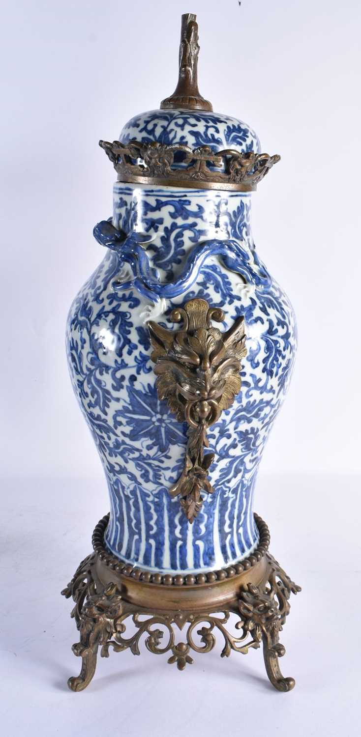 A LARGE PAIR OF 19TH CENTURY CHINESE BLUE AND WHITE BRONZE MOUNTED VASES Qing. 48 cm high. - Image 3 of 24