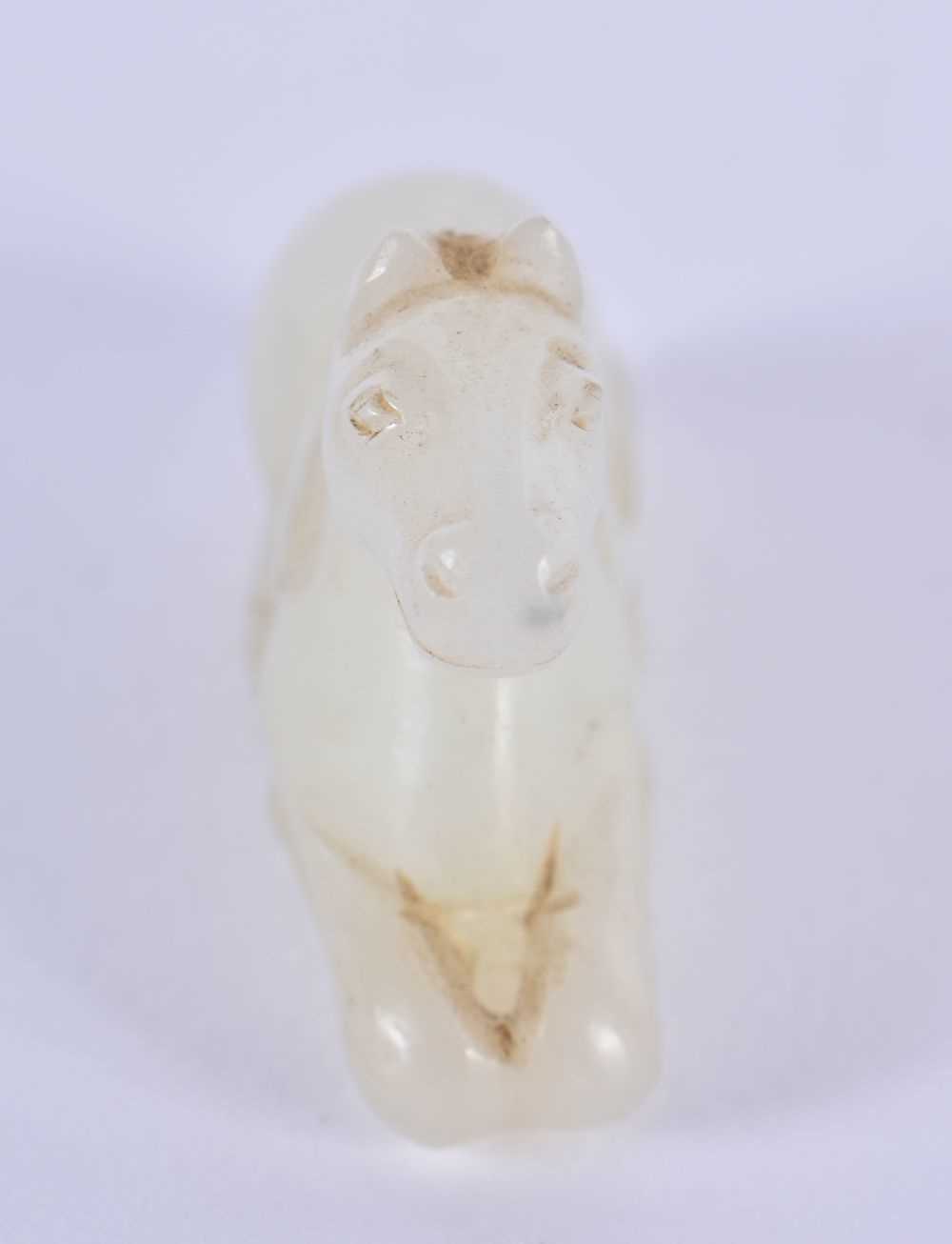 A 19TH CENTURY CHINESE CARVED WHITE JADE FIGURE OF A RECUMBANT HORSE Qing. 3 cm x 2 cm. - Image 3 of 12
