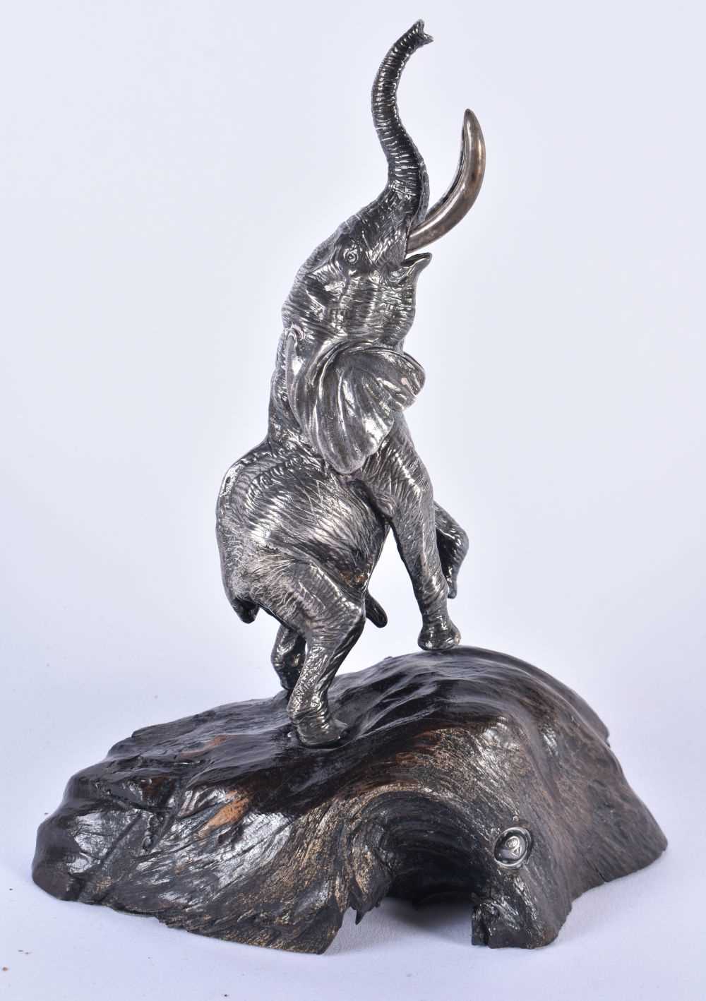 A LOVELY SILVER AND AFRICAN BLACKWOOD SCULPTURE OF AN ELEPHANT by Patrick Mavros. 20 cm x 10 cm.