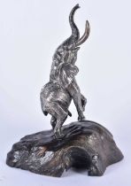 A LOVELY SILVER AND AFRICAN BLACKWOOD SCULPTURE OF AN ELEPHANT by Patrick Mavros. 20 cm x 10 cm.