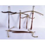 A COLLECTION OF VINTAGE SHOP DISPAY COAT HANGERS. Largest 50 cm x 40 cm. (qty)