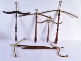 A COLLECTION OF VINTAGE SHOP DISPAY COAT HANGERS. Largest 50 cm x 40 cm. (qty)