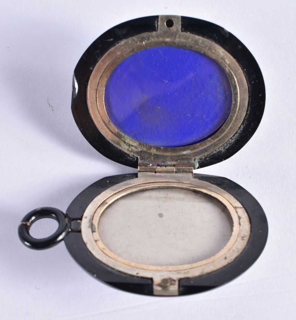 A Victorian Jet Mourning Locket set with a Gold Cross mounted with Pearls. 5.5cm x 3.7cm x 1.7cm, - Image 2 of 3