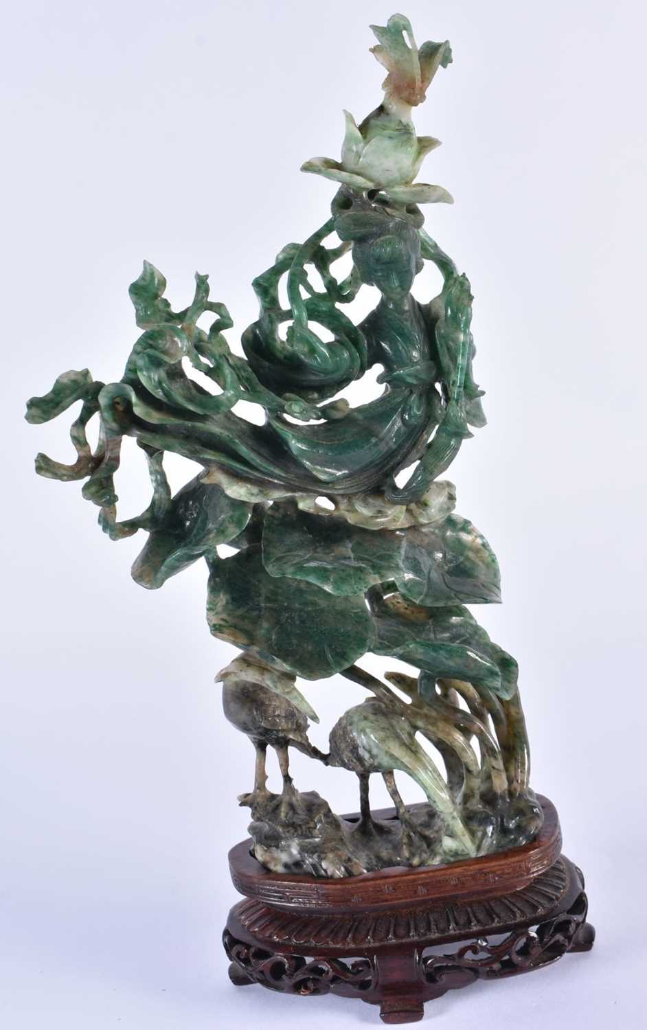 A LARGE EARLY 20TH CENTURY CHINESE CARVED TRI COLOUR JADEITE FIGURE OF AN IMMORTAL Late Qing/ - Image 2 of 6