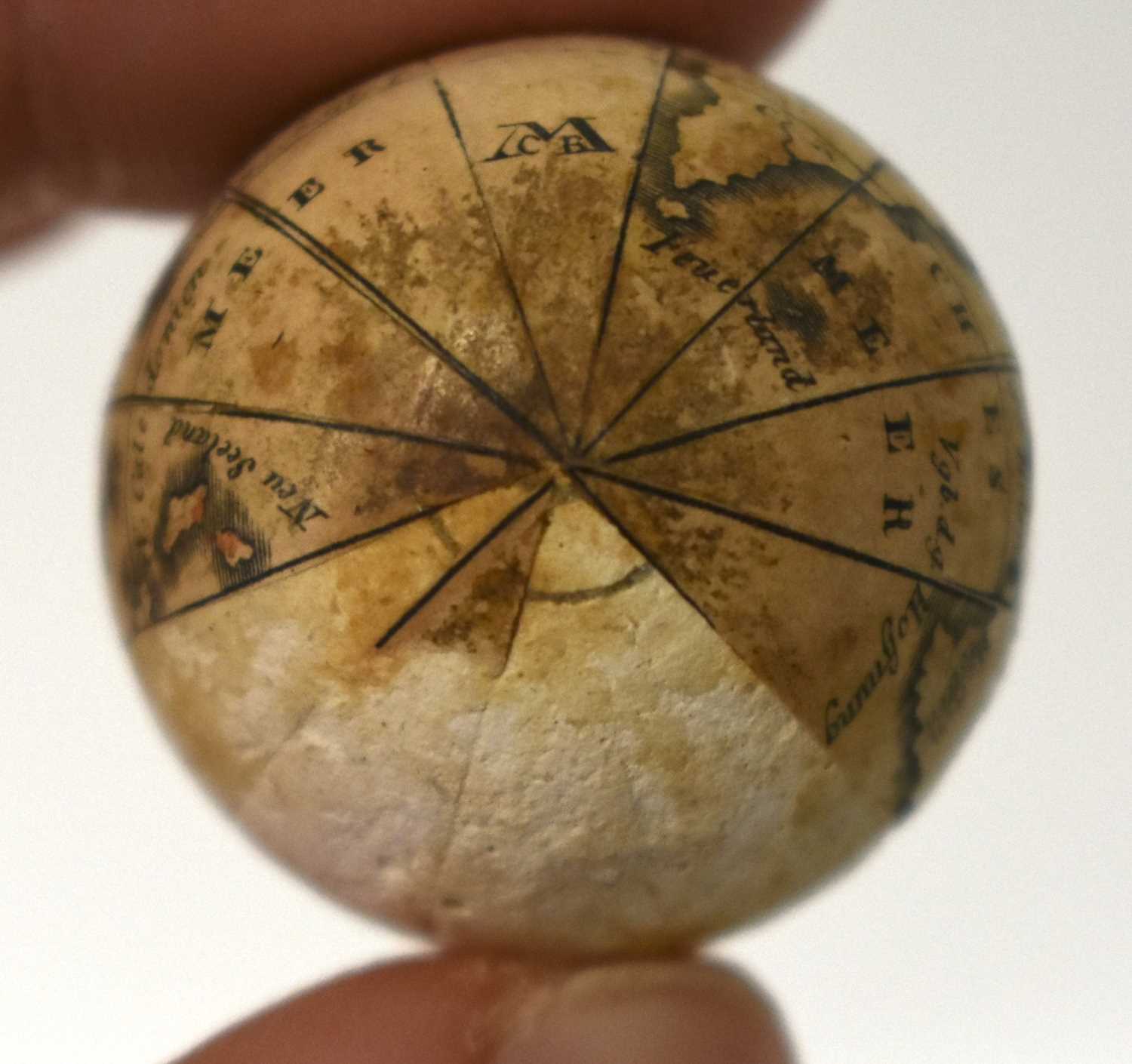 AN EXTREMELY RARE ANTIQUE CARVED NUT GLOBE the body rotating to reveal a tiny pocket globe. Nut 6 cm - Image 18 of 20