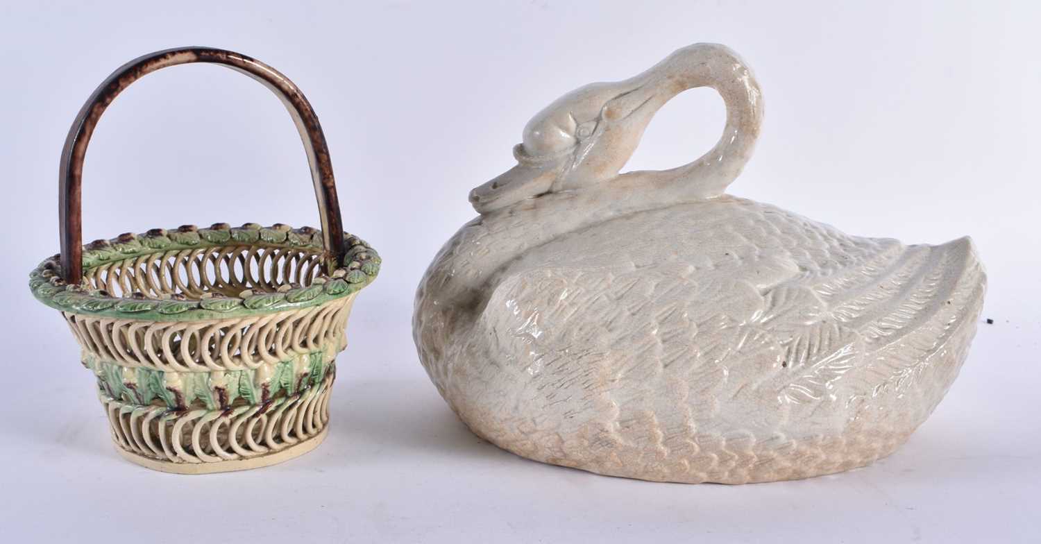 AN EARLY 19TH CENTURY CREAMWARE RETICULATED BASKET together with a C1800 salt glazed swan tureen