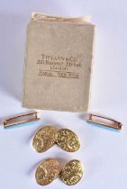 A PAIR OF 18CT GOLD ENGRAVED CUFFLINKS together with a pair of Edwardian yellow metal and