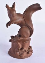 A MEISSEN BOTTGER STEINZEUG STONEWARE FIGURE OF A SQUIRREL modelled upon a naturalistic base. 15