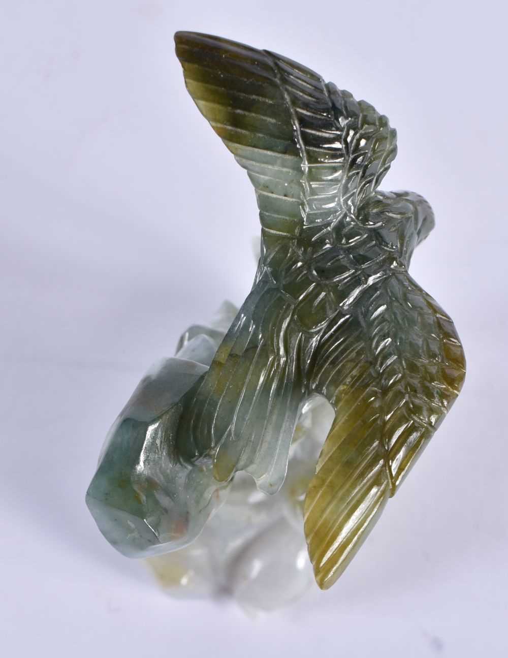 AN EARLY 20TH CENTURY CHINESE CARVED JADEITE FIGURE OF AN EAGLE Late Qing/Republic. 12 cm x 6 cm. - Image 5 of 6