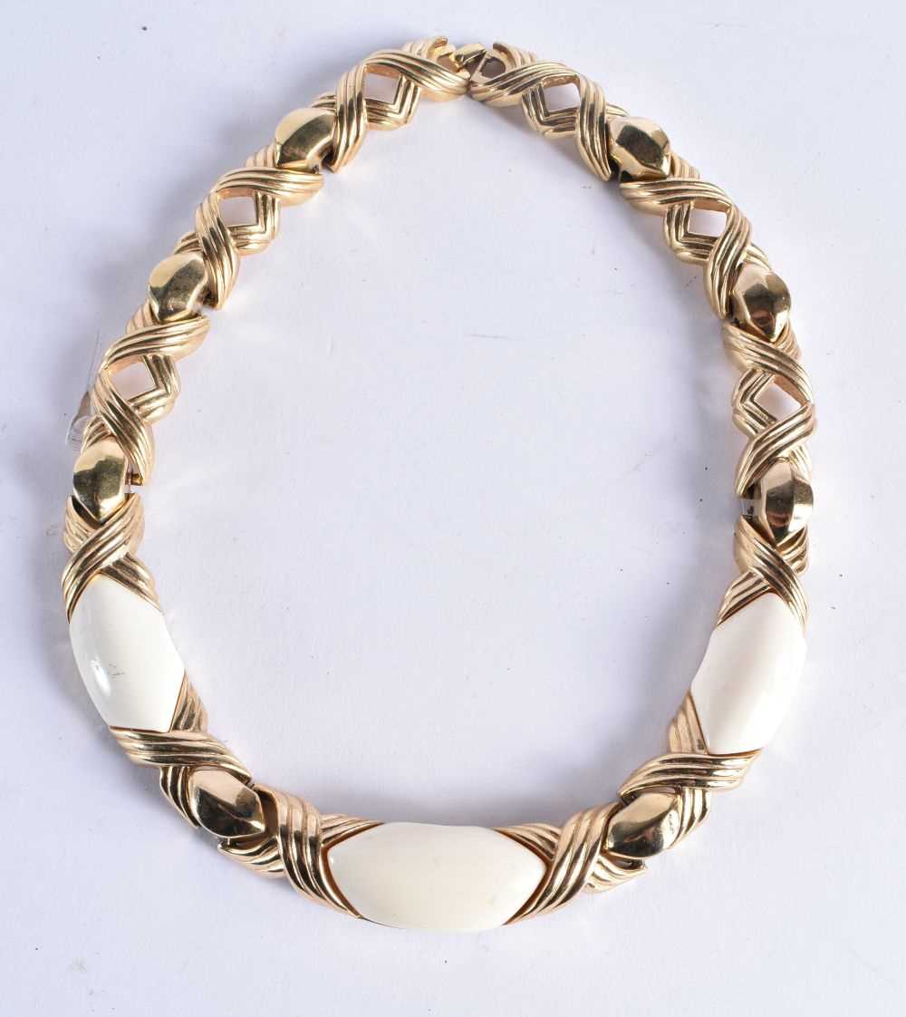 Gold tone enamel collar necklace by designer Christian Dior. 151 grams. 45 cm long.