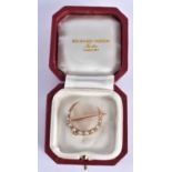 An Antique Gold Crescent Moon Shaped Brooch set with Diamonds and Pearls. 2.5cm diameter, weight 3.