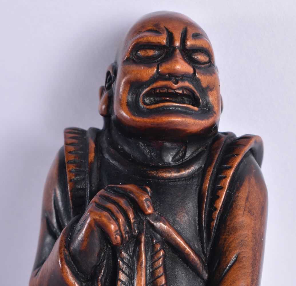 A VERY RARE LARGE JAPANESE BOXWOOD SASHI NETSUKE modelled as a Mongolian Archer. 12.5 cm high. Note: - Image 3 of 8