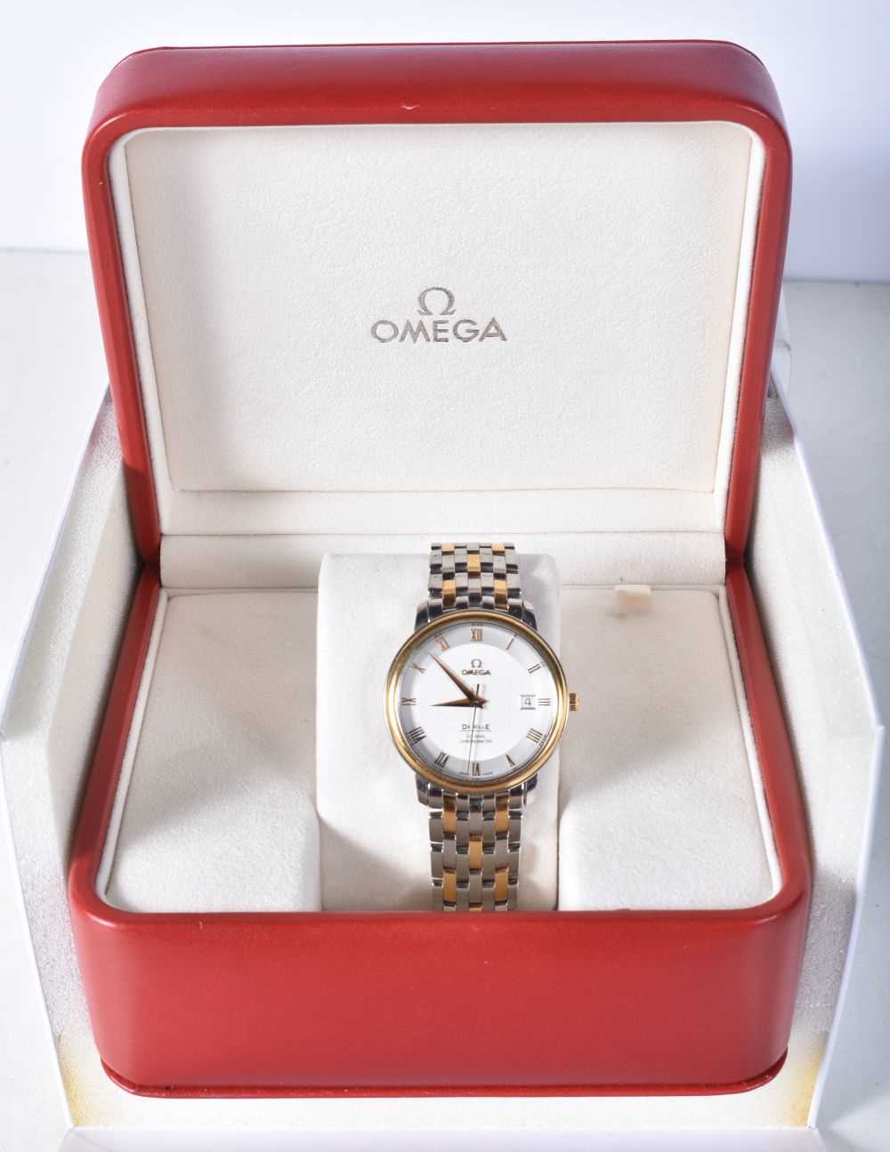 A Boxed OMEGA De Ville Prestige Co-Axial Chronometer 40 mm.  Working with papers
