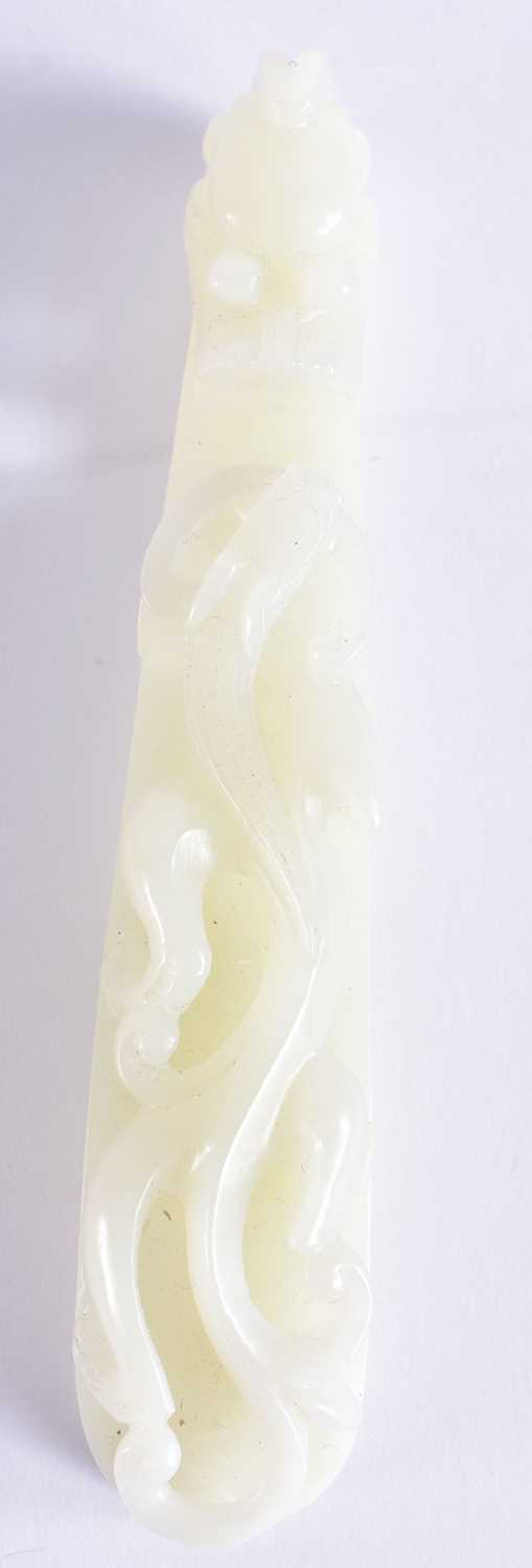 A FINE PAIR OF CHINESE QING DYNASTY CARVED GREENISH WHITE JADE BELT HOOKS Qing, formed as stylised - Image 12 of 30