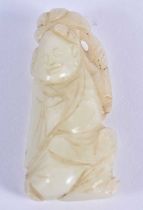 A 19TH CENTURY CHINESE GREENISH WHITE JADE FIGURE OF A YOUNG BOY Qing, modelled holding a flower.