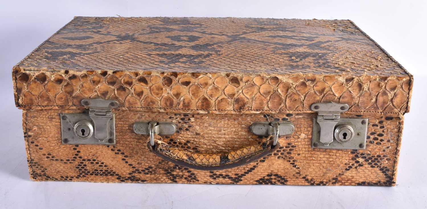 AN ANTIQUE TAXIDERMY WORKED SNAKE SKIN SUITCASE. 44 cm x 30 cm.