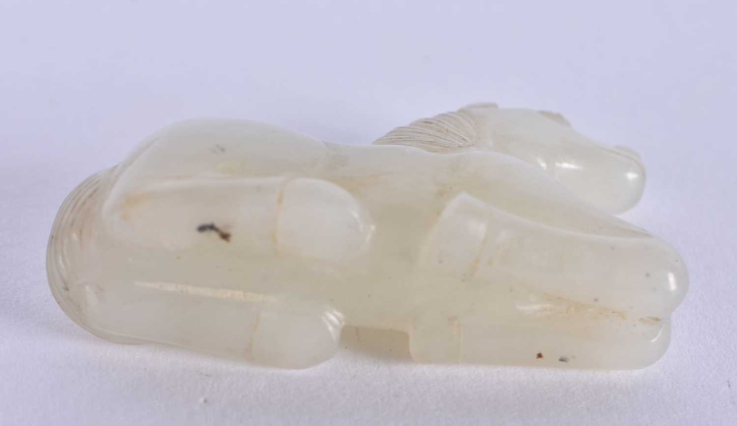 A 19TH CENTURY CHINESE CARVED WHITE JADE FIGURE OF A RECUMBANT HORSE Qing. 3 cm x 2 cm. - Image 4 of 12