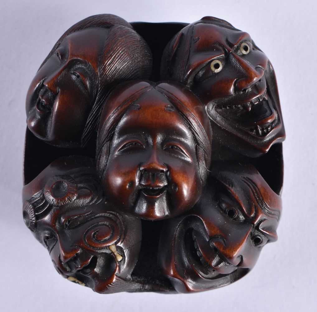 A 19TH CENTURY JAPANESE MEIJI PERIOD BOXWOOD NOH MASK NETSUKE finely carved, bearing old