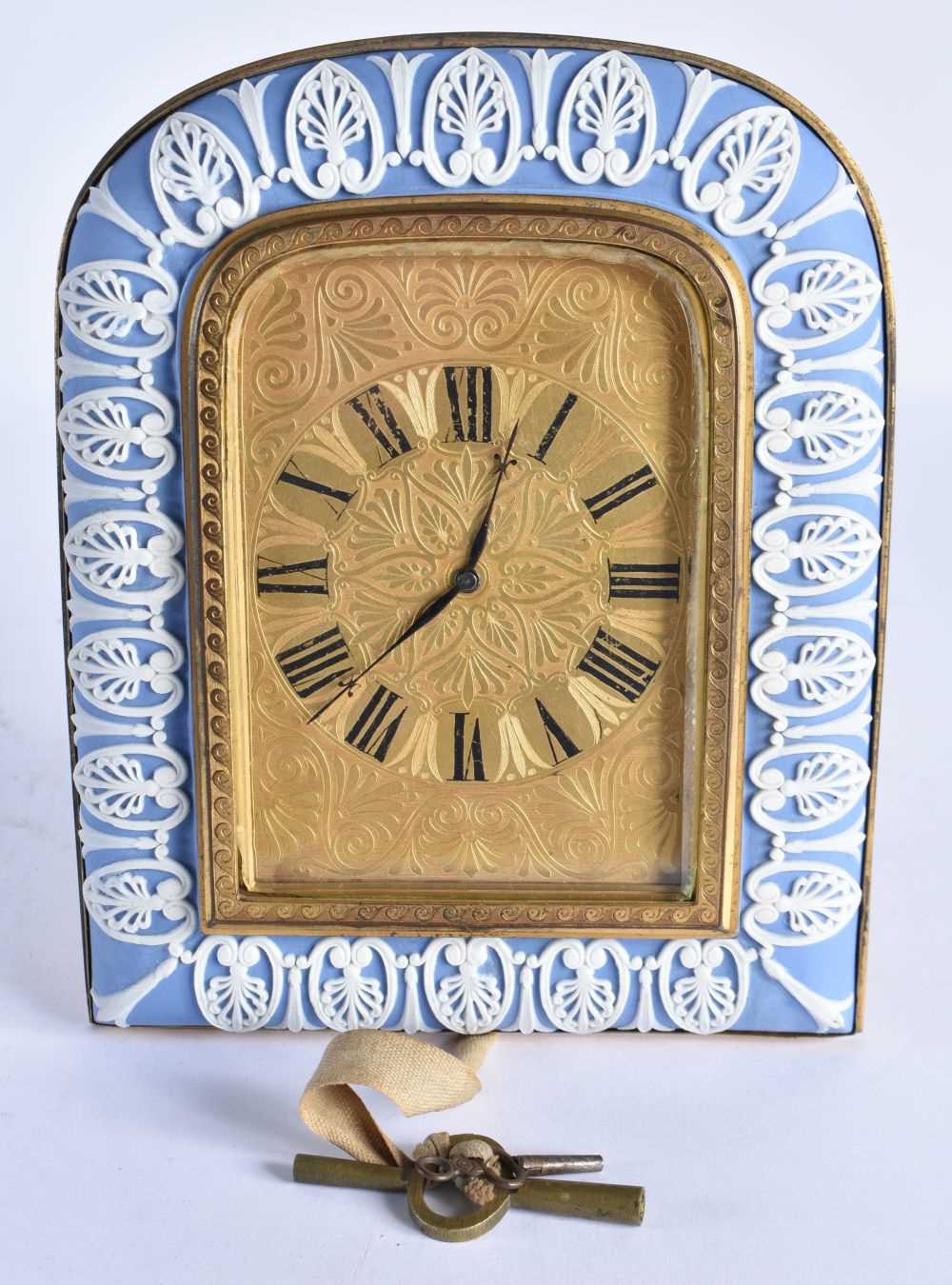 A RARE 19TH CENTURY ORMOLU AND WEDGWOOD PORCELAIN JASPERWARE CLOCK in the Manner of Thomas Cole, the