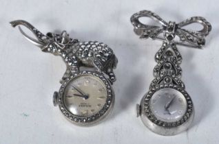 Two Ladies Silver and Marcasite Brooch Watches (Prolux and Bucherer). Stamped 925. Hand-Wind.